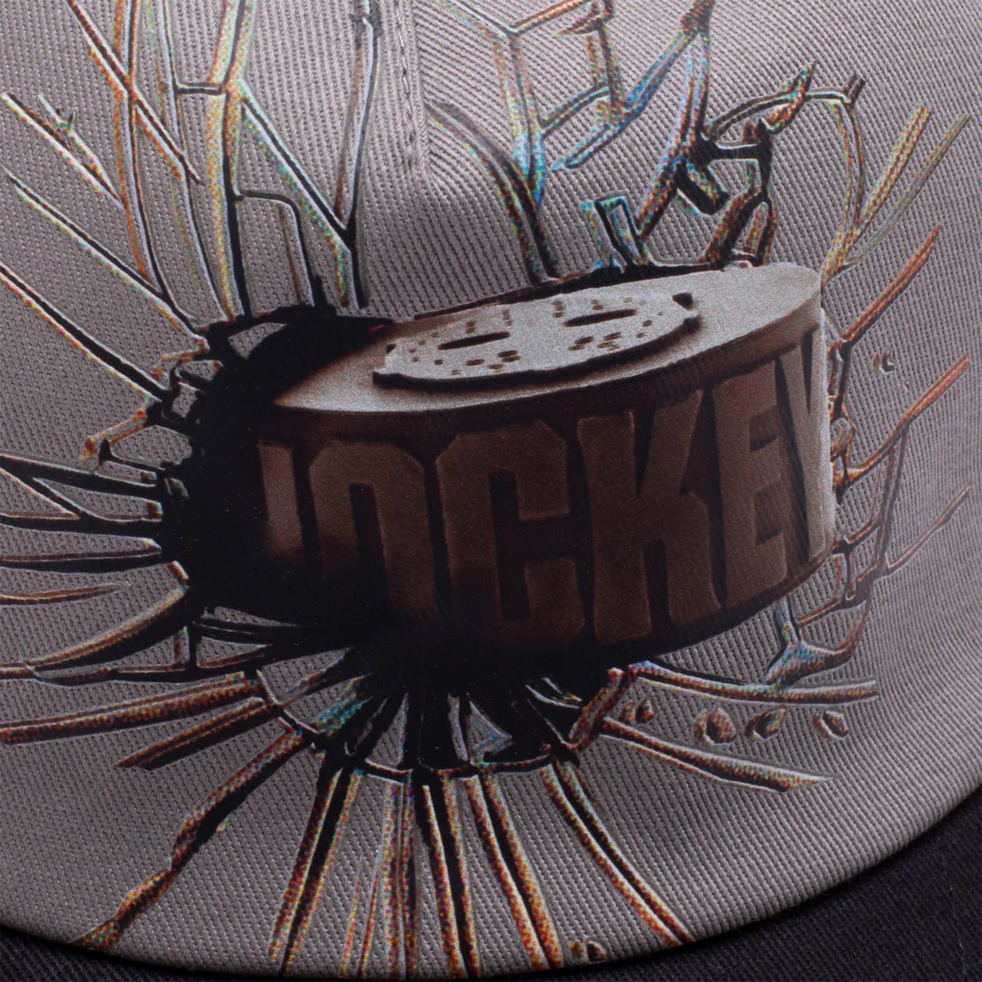 HOCKEY_0012_2026_Hockey_QTR1_GraphicDetail_Hats_WaxShatter_GreyBlank_Detail.jpg