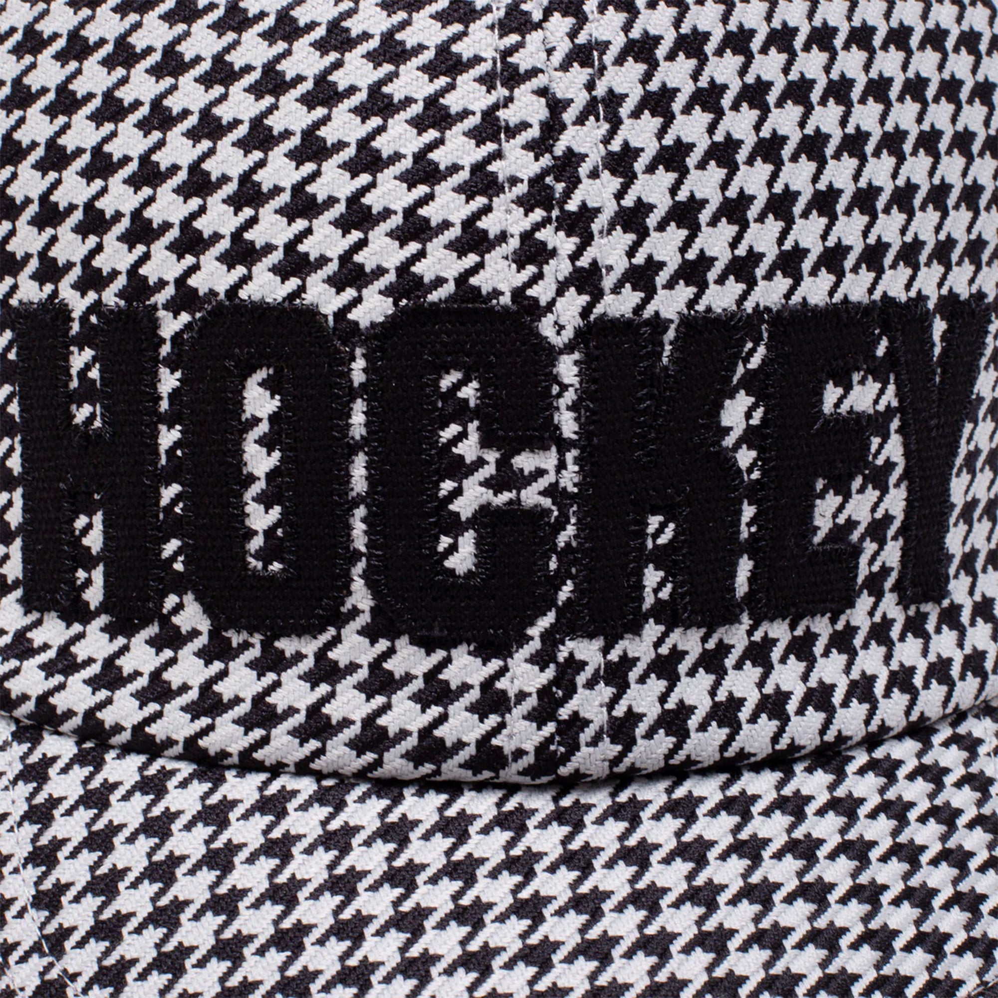 HOCKEY_0024_2026_Hockey_QTR1_GraphicDetail_Hats_HockeyHounds_Black_Detail.jpg