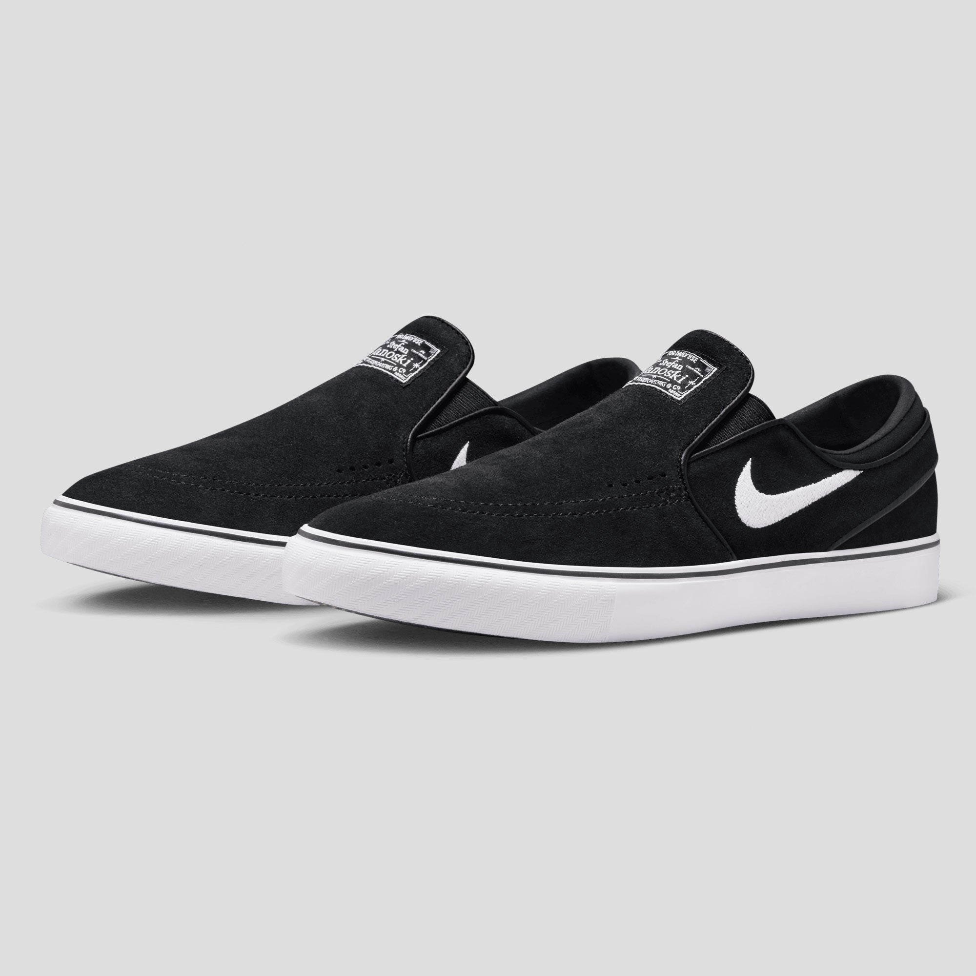 Nike SB Zoom Janoski+ Slip-on - Black / White