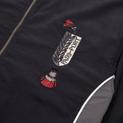 Pass~Port Tassle RPET Delivery Jacket - Black / Grey