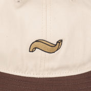PASS~PORT "TILDE" BUCKET HAT CHOC